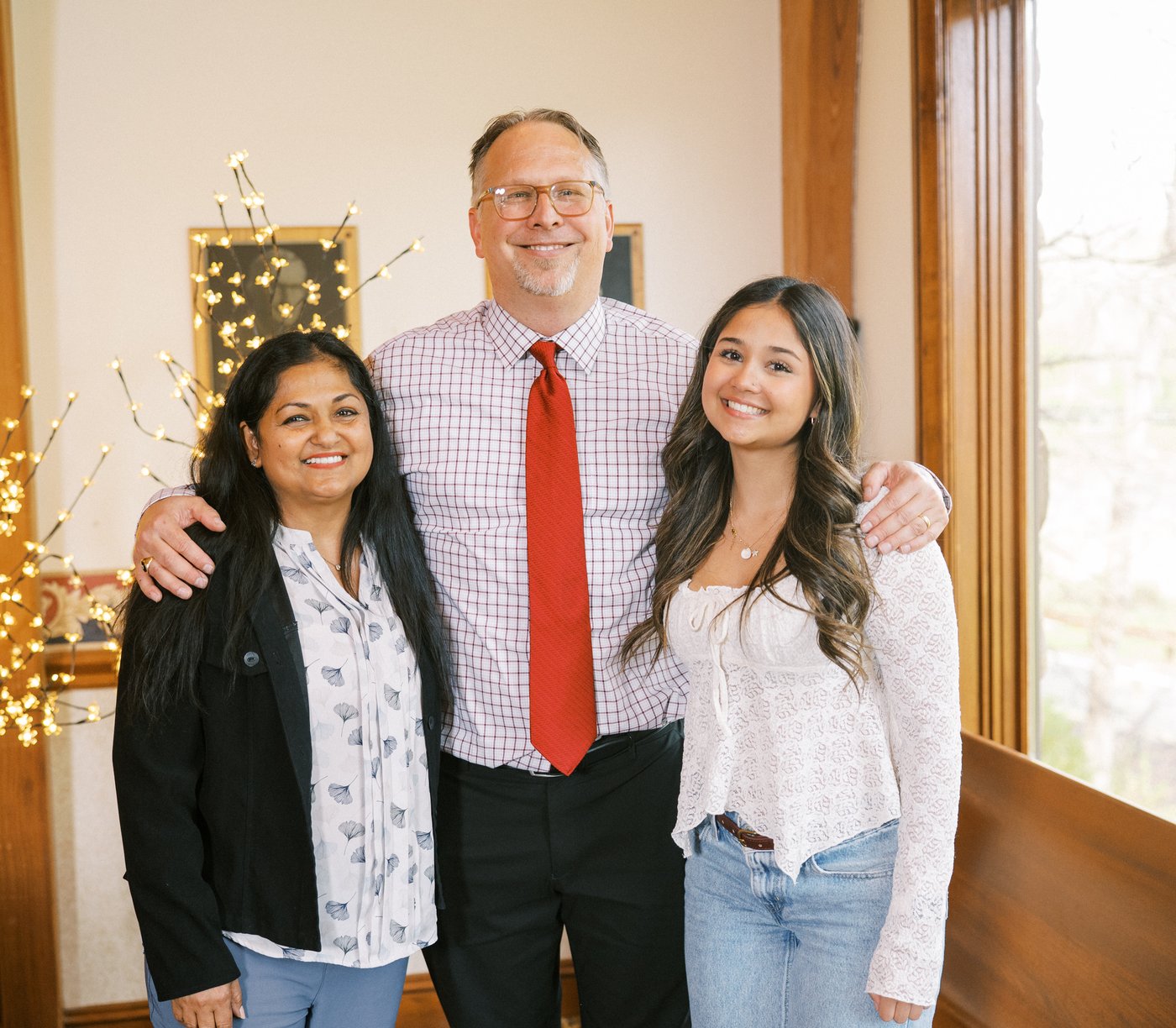 Ryan with his wife and daughter at the church.